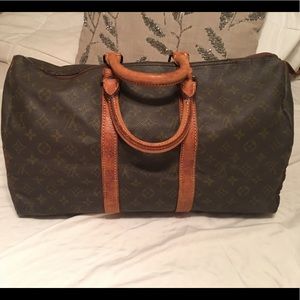 Authentic vintage Louis Vuitton.